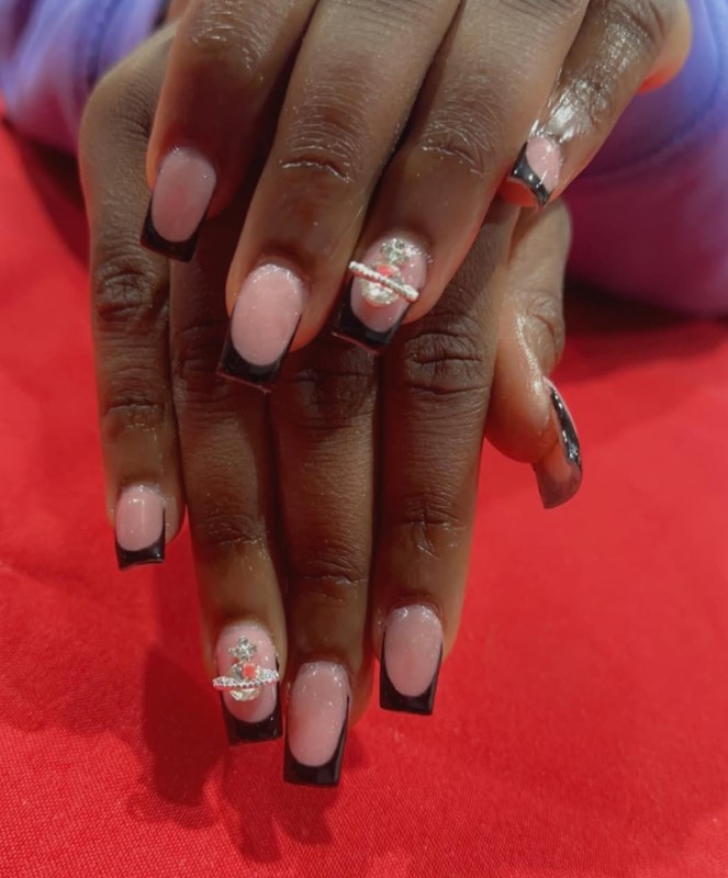 Black French tips with silver details and gems