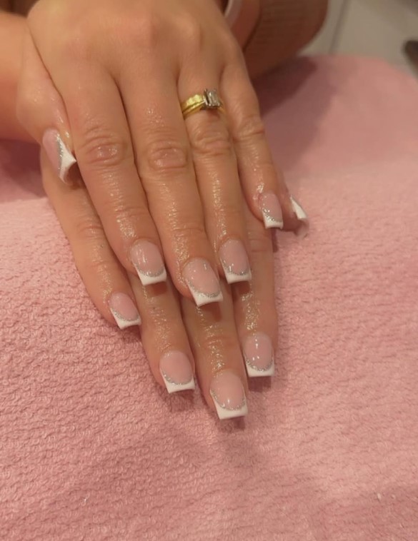 White French tips with silver accents